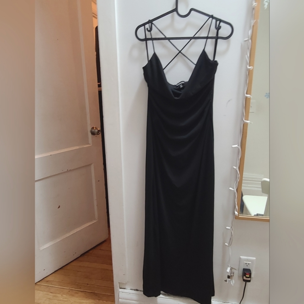 Le Chateau floor length black cowl neck dress with criss cross back. Size M.